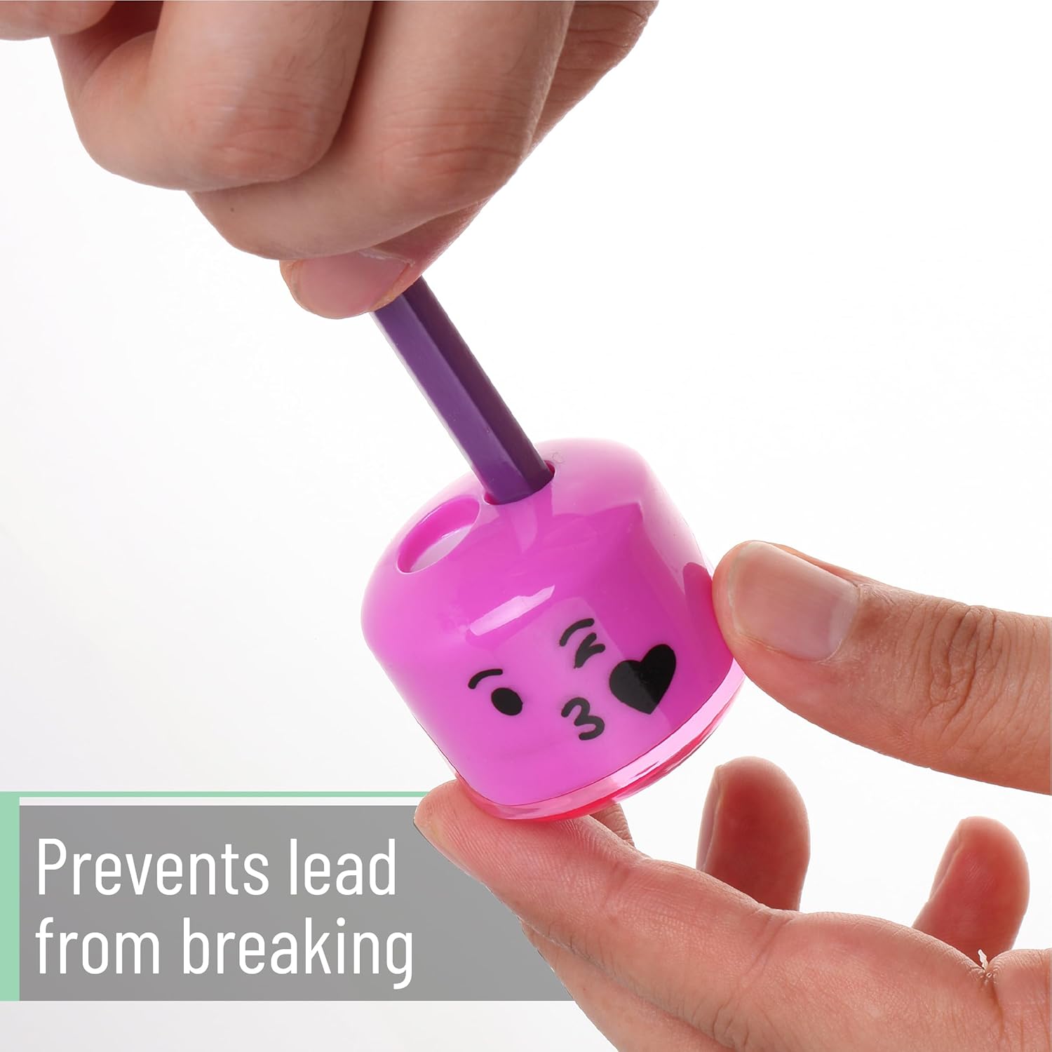 Hand holding a Mr. Pen pencil sharpener while sharpening a pencil, demonstrating lead breakage prevention.