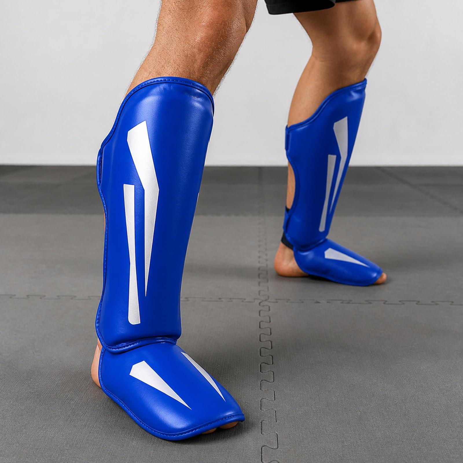 Piedi Protezione Shin Guard,Parastinchi Piedi Protezione Shin Guard,Boxing Parastinchi Uomo e Donna,Regolabili,Comodo,per Boxe,Sport da Combattimento e Allenamento Quotidiano