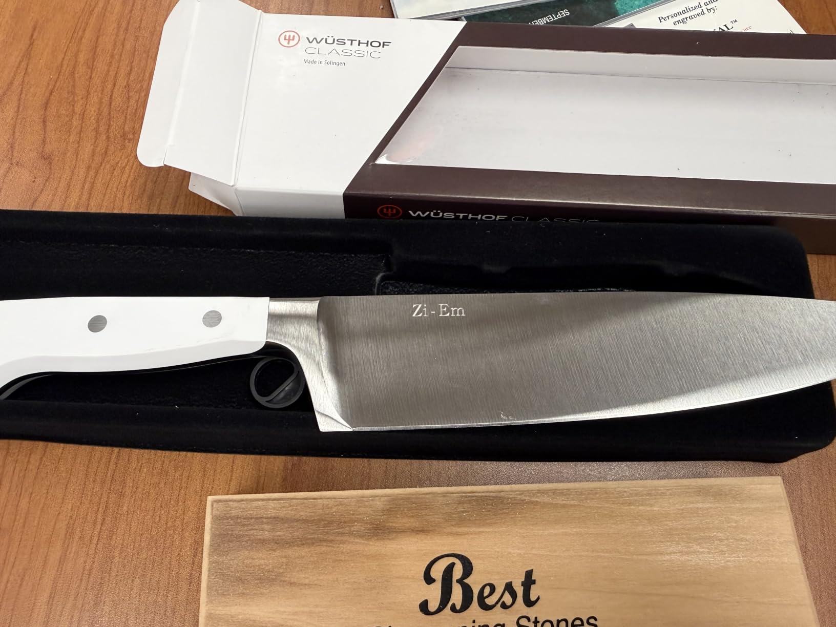 Wusthof Classic chef knife on cutting board with vegetables