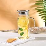 Pitcher en verre résistant à la chaleur avec lis et goutte, Pitchers en verre de thé glacé Pitcheurs de boissons pour réfrigérateur, pitcher d'eau en verre et carafe 1000ml/34oz