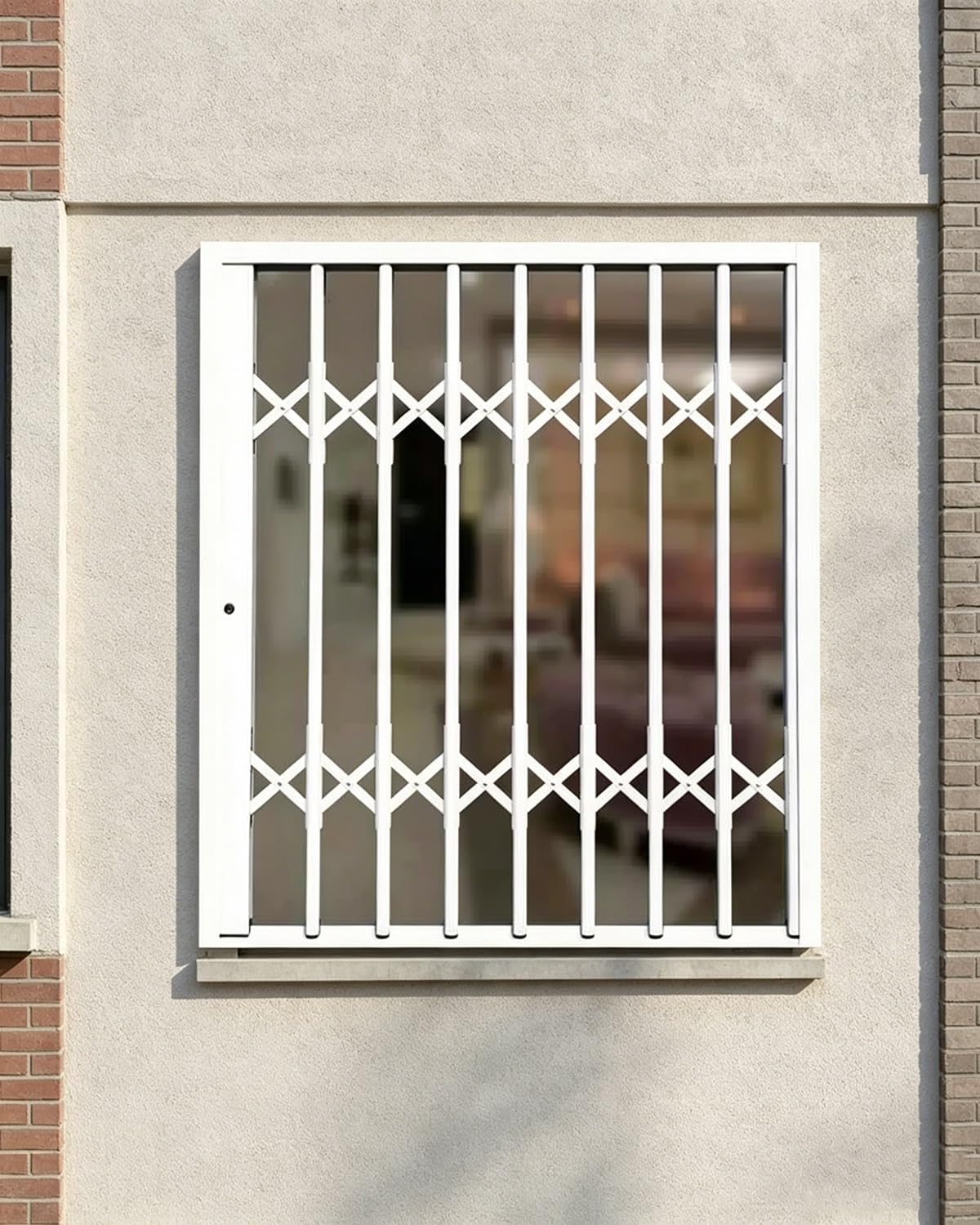 Reja antirrobo para ventana tipo acordeón en aluminio blanco con cerradura firme de 119x119cm