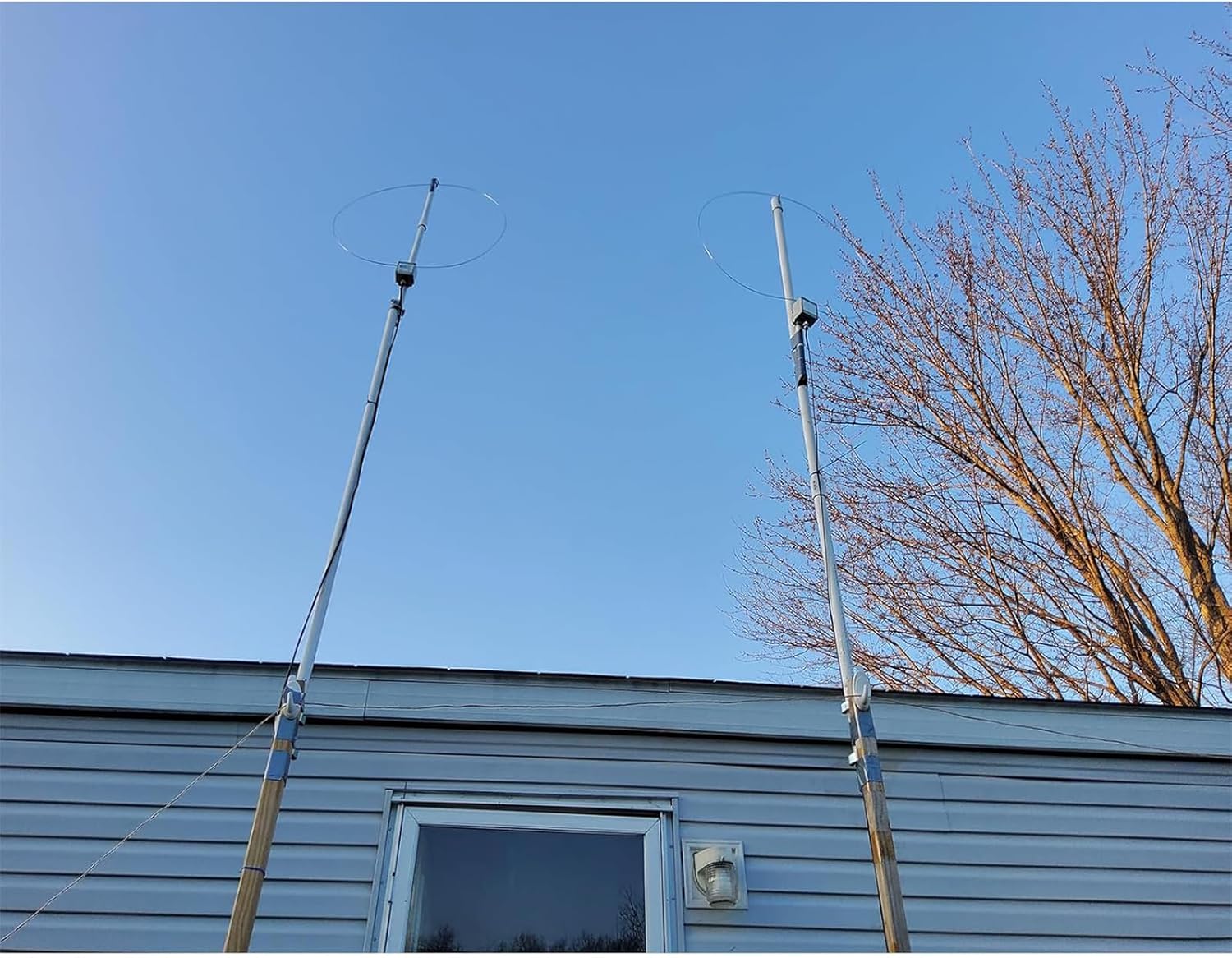 Two K-480WLA antennas installed outdoors on poles