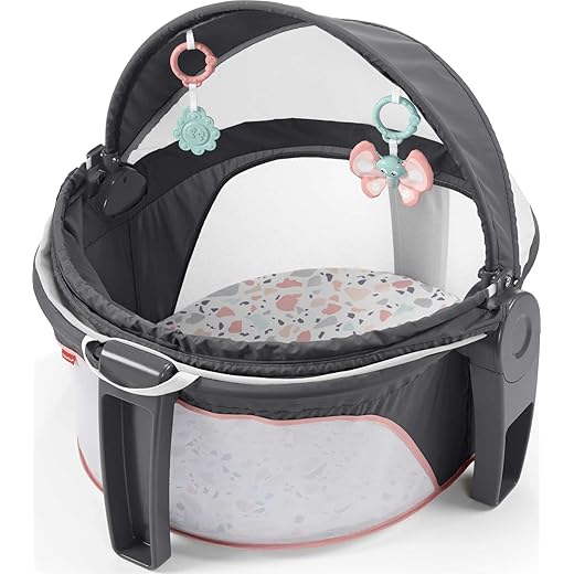Fisher-Price Baby Portable Bassinet and Play Space On-the-Go Baby Dome with Developmental Toys and Canopy, Pink Pacific Pebble