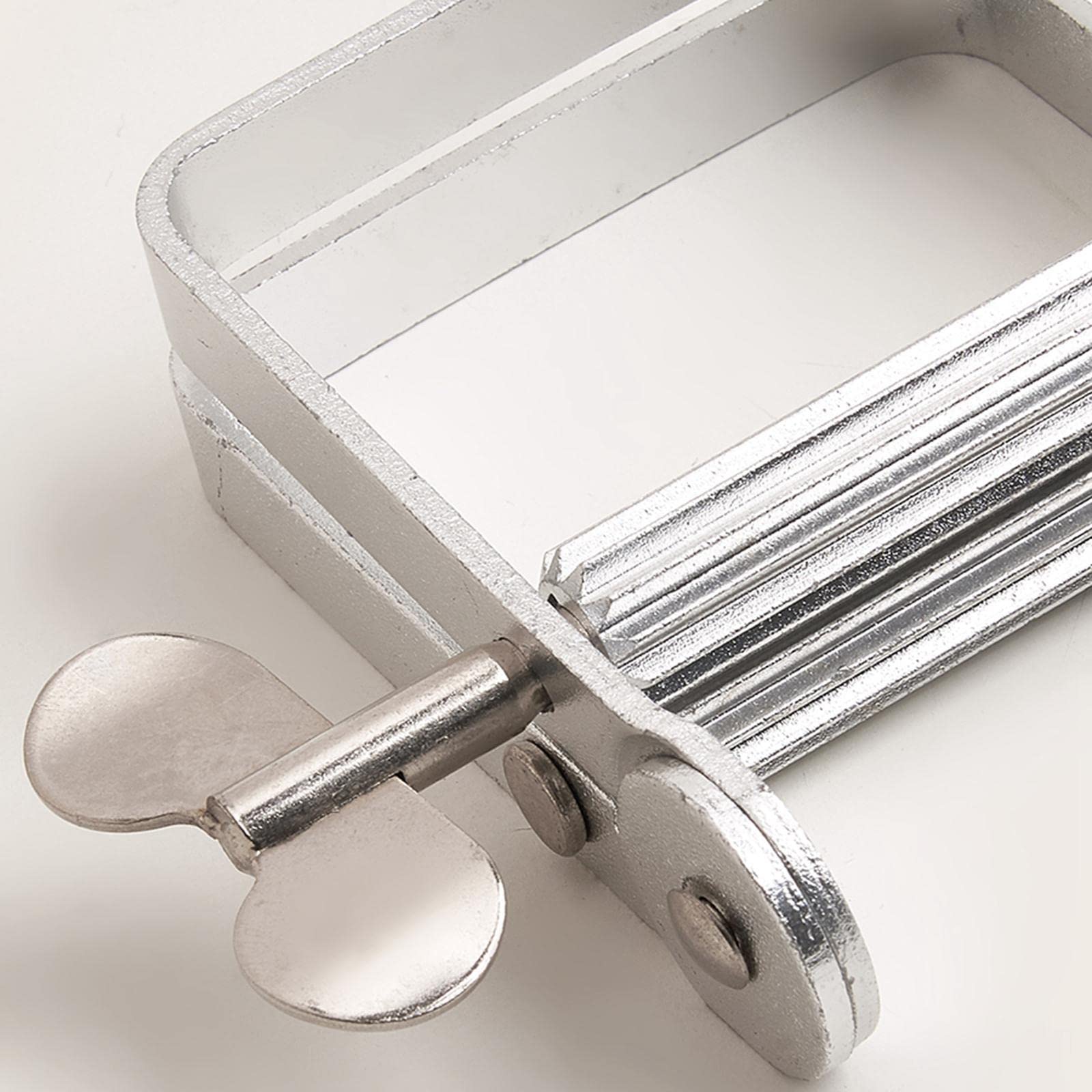 MORSETTI METALLICI DISPENSER a rulli manuali per dentifricio strumento