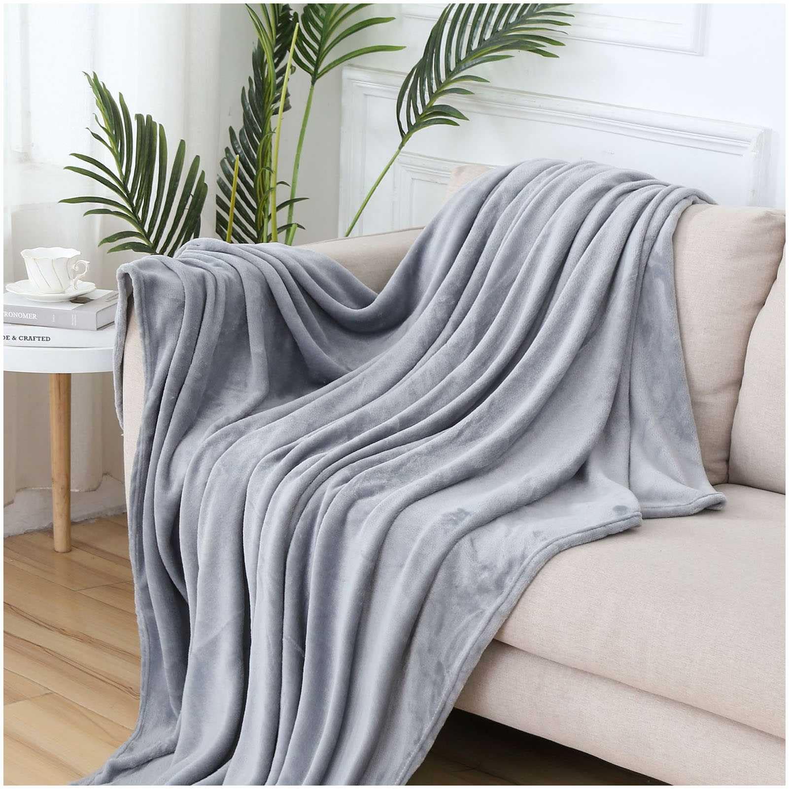 Jeté chaud en polaire couverture douce pour une soirée cocooning sur le canapé