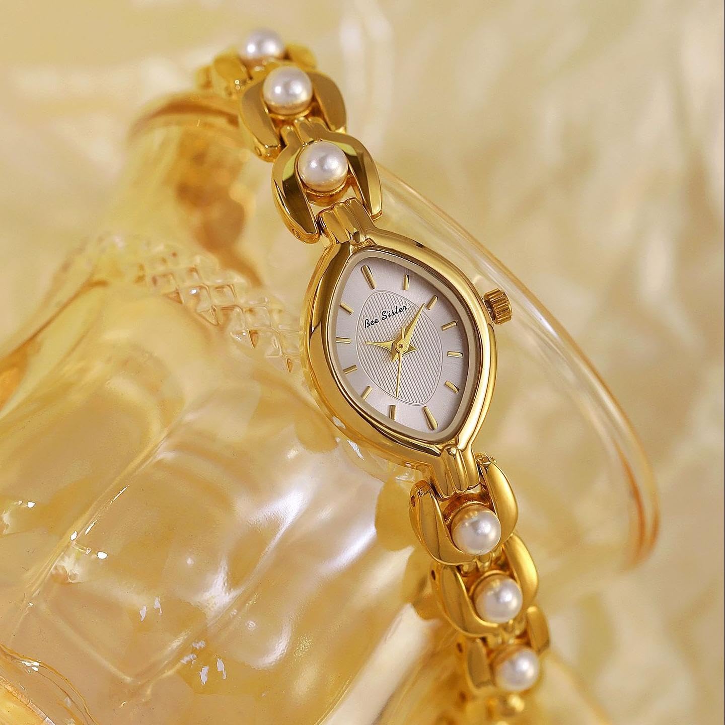 CARLIEN Orologio da polso da donna, piccolo quadrante ovale dorato, cinturino in perle, sottile, minimalista, elegante bracciale rigido