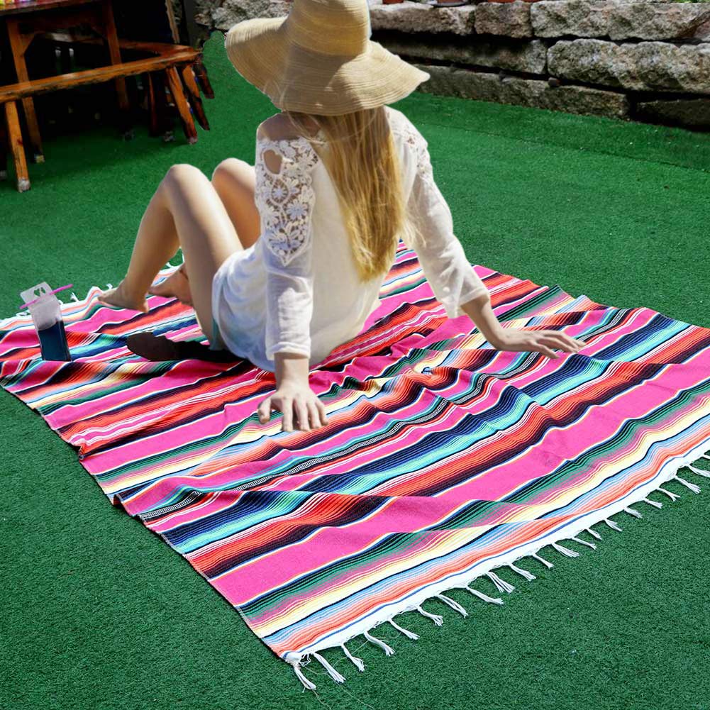 Real-world look of Fowecelt Mexican Serape Blanket Tablecloth 59 x 84 Inch for Mexican Party Wedding Decorations Outdoor Picnics Dining Table, Large Square Fringe Cotton Handwoven Table Cloth showing its unique texture and premium design