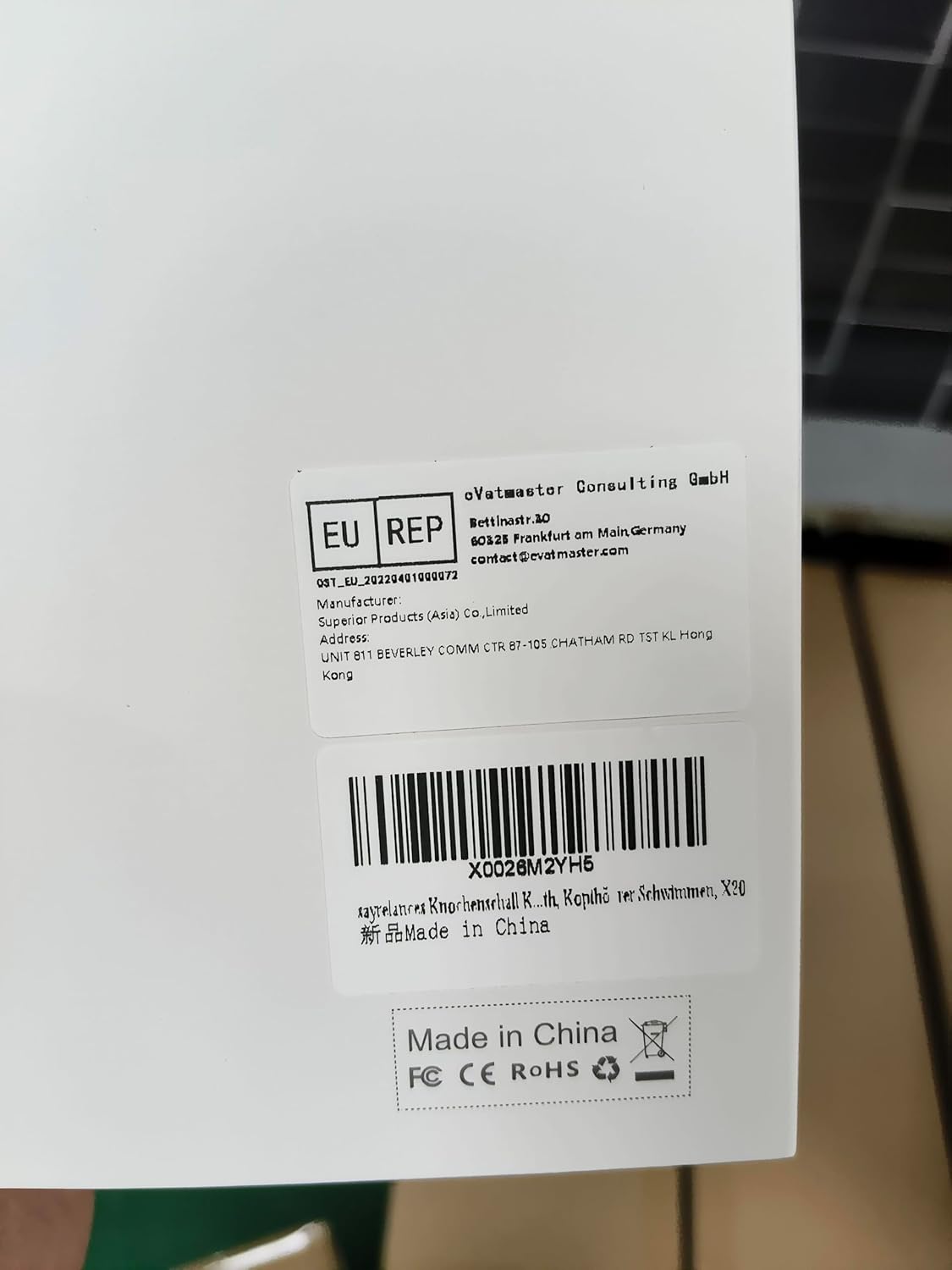 Back view of the Sayrelances headphone product box with regulatory information
