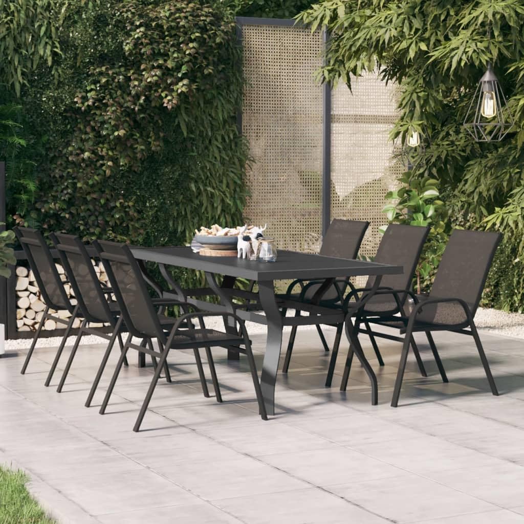 Table de terrasse extérieure grise pour de grands repas conviviaux en famille