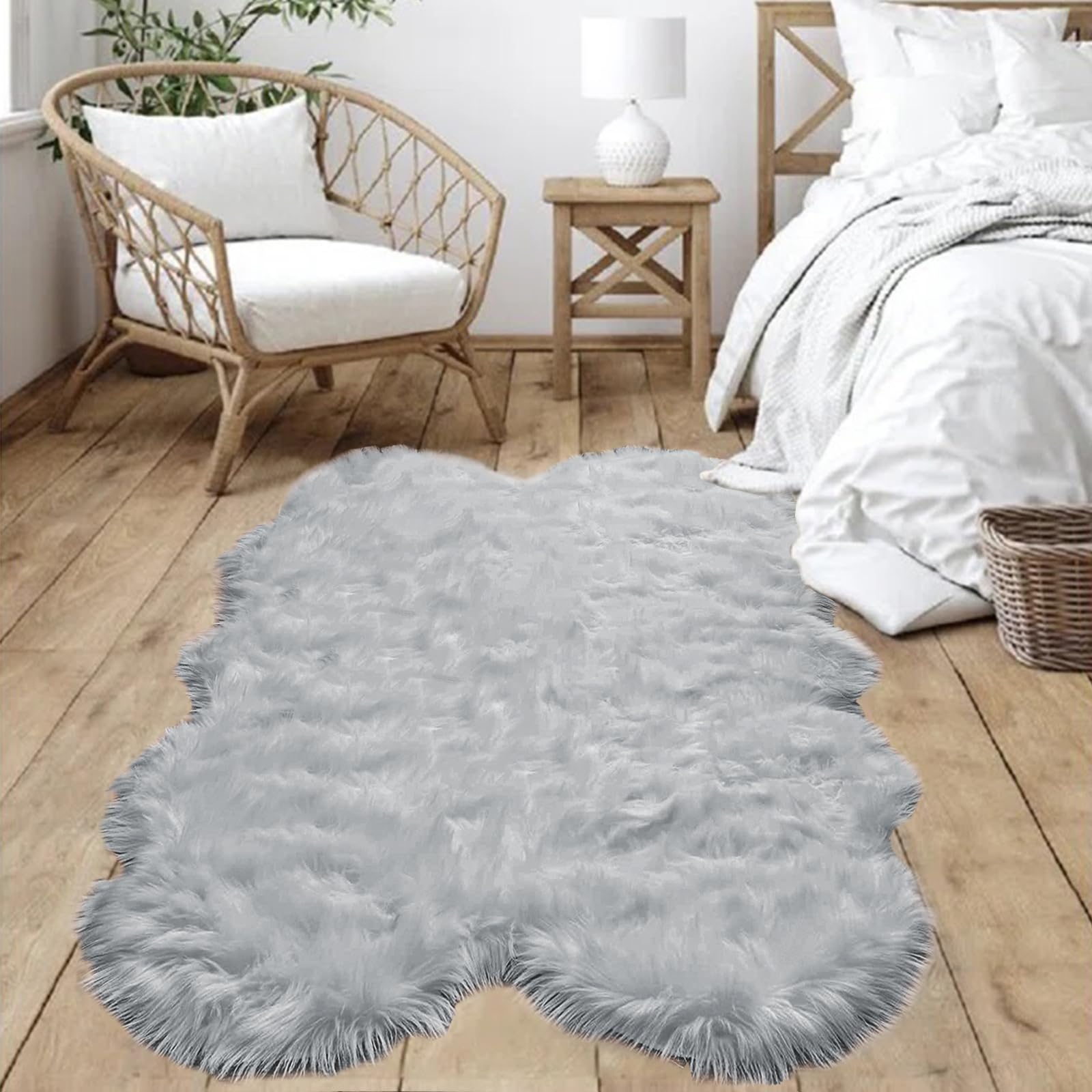 Photo 1 of Goolela Faux Sheepskin Fur Rug 4x6 Grey Fluffy Fuzzy Furry Area Rug for Bedroom Playroom Plush Shaggy Washable Irregular Sheepskin