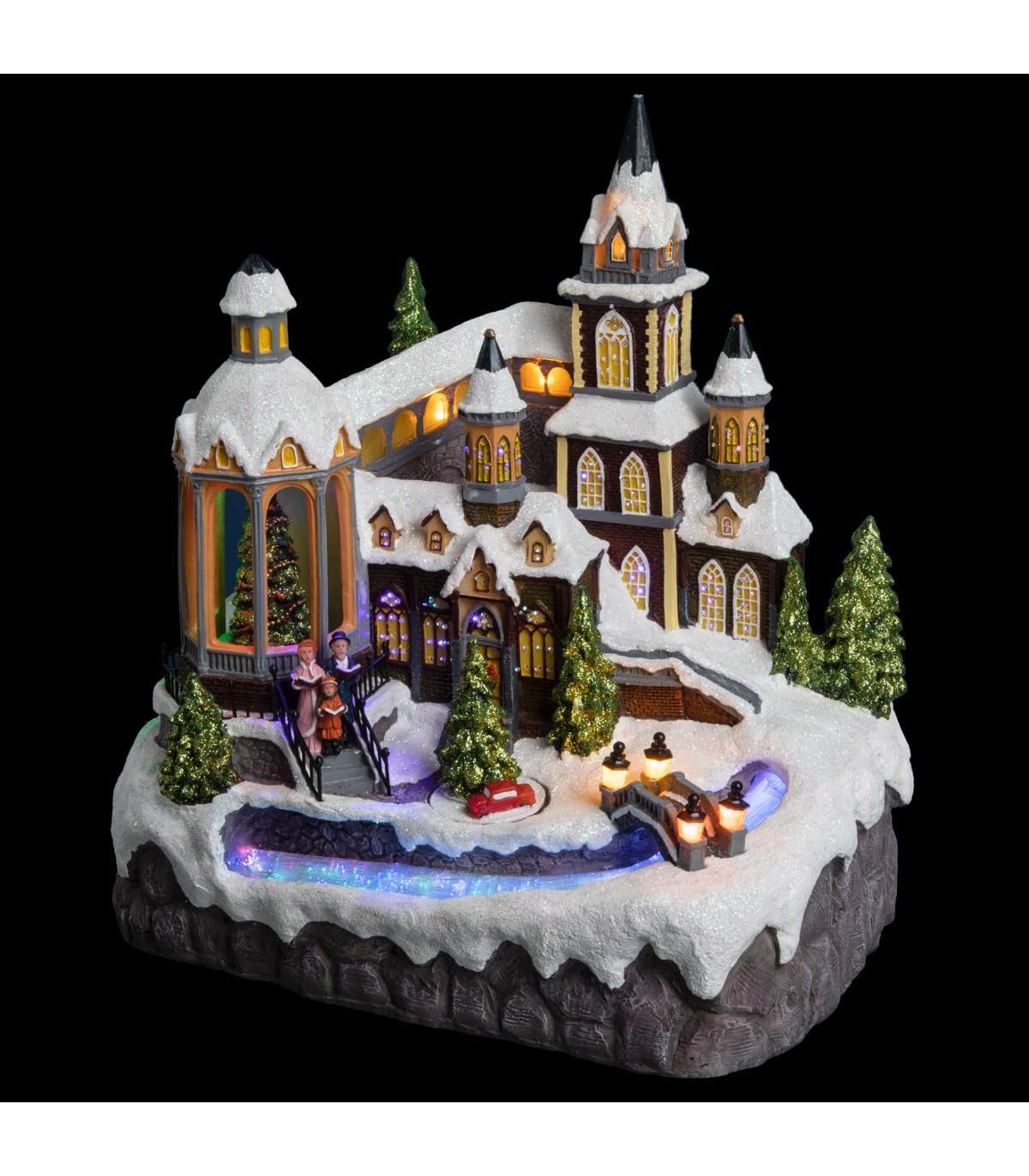 Village de noël église au bord de la rivière pour illuminer vos soirées d'hiver en famille