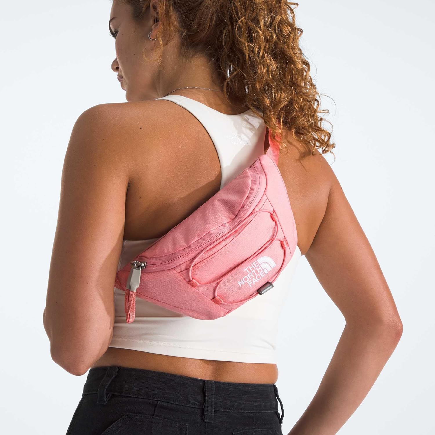THE NORTH FACE Jester Lumbar Pack - Fanny Pack with Water Repellent Finish, 2.2 Liters, Crossbody Adjustable Strap, Coral Crush Light Heather/Coral Crush, One Size