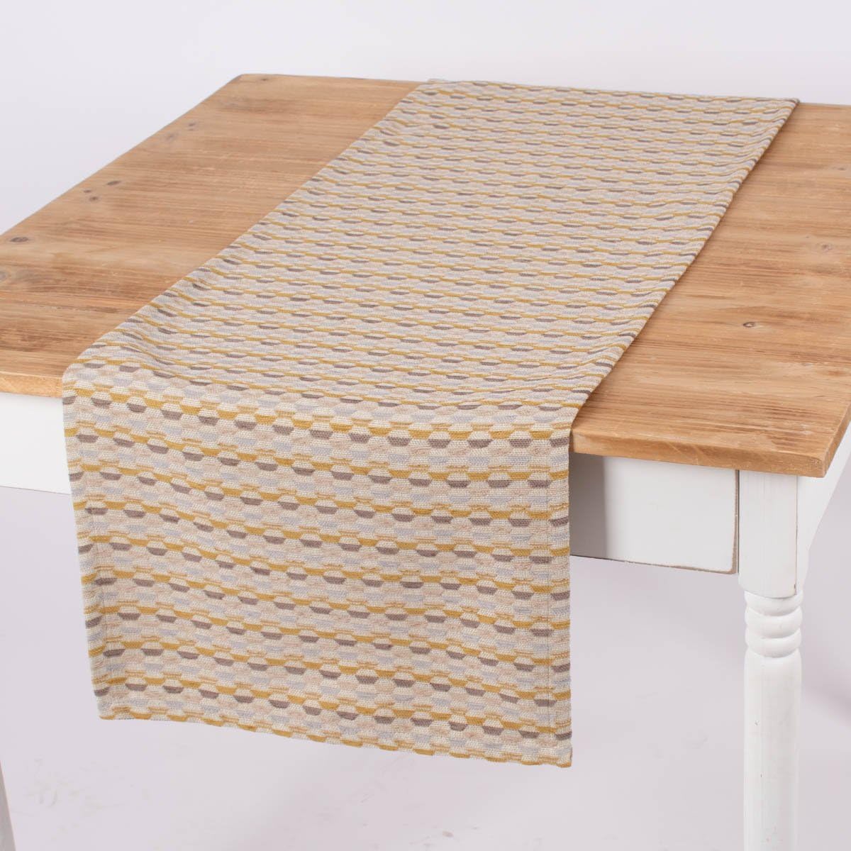 Chemin de table hexagonal Mira beige jaune 40x160 cm pour protéger votre table avec style