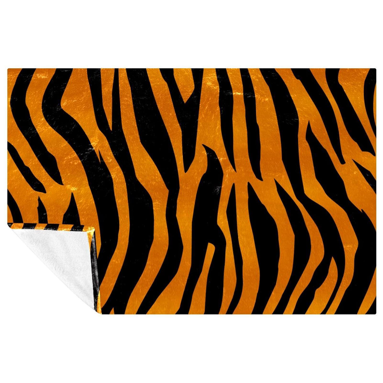 Couverture tigre douce contre le froid sur votre lit ou en pique-nique