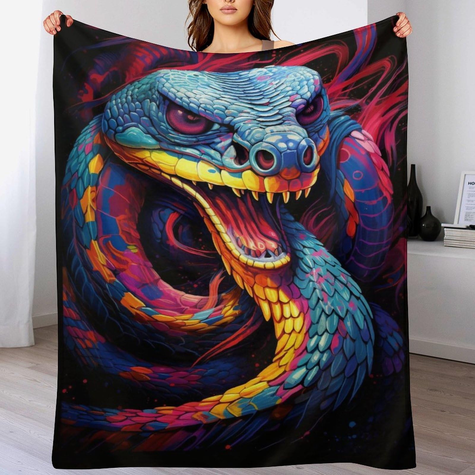 Couverture polaire serpent douce pour vos soirées cocooning sur le canapé