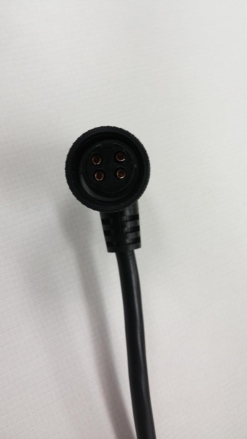 Close-up view of the 4-pin circular connector for the Spectra Precision Charger