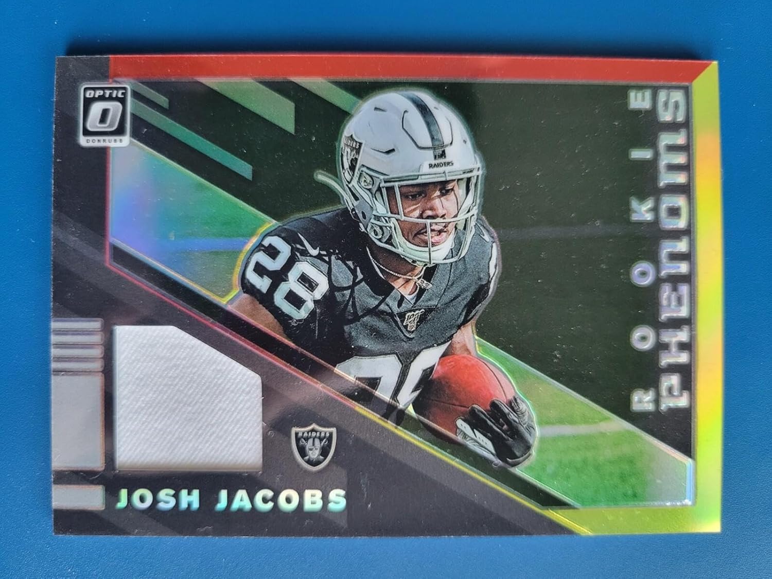 Josh Jacobs 2019 OPTIC "ROOKIE PHENOMS" RC JSY RED & YELLOW #RP8 L.V. RAIDERS! - Football Cards