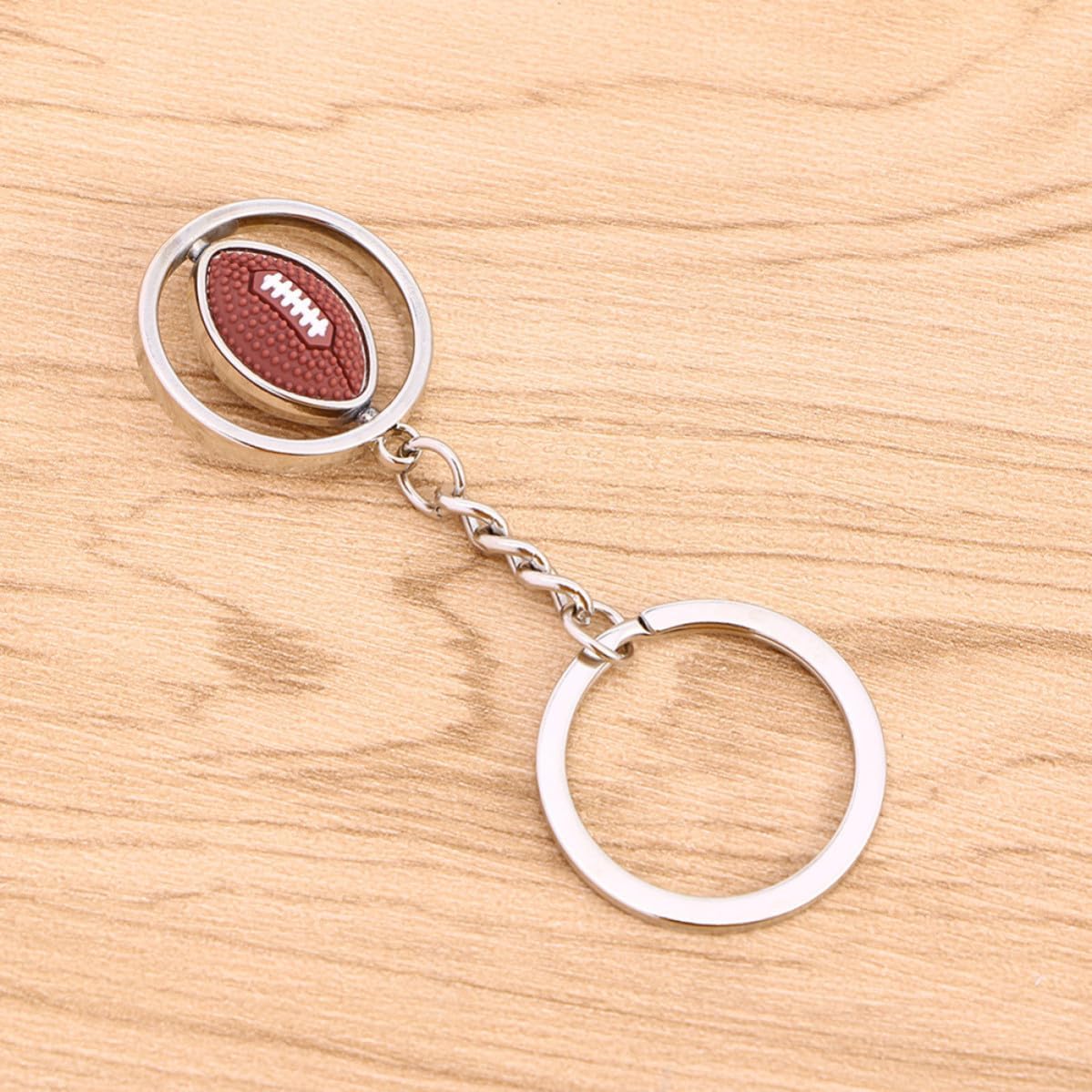 4pcs Rugby Shaped Metal Key Ring with Rotating Ball Design image 4