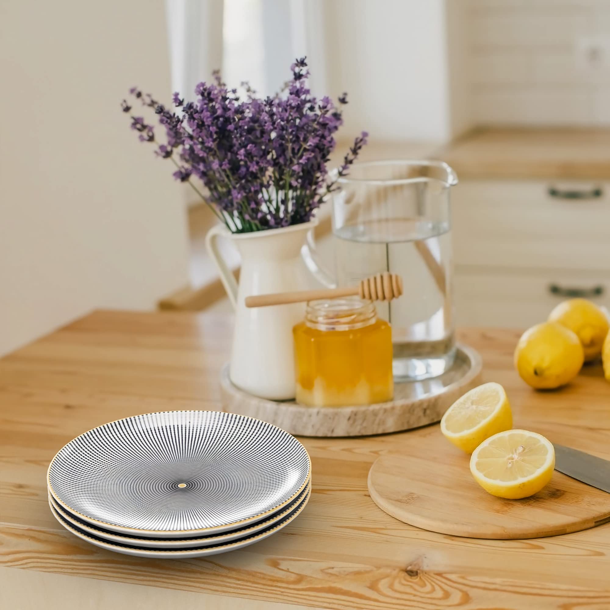 INTIRILIFE 4x Plato de porcelana en Infinito - Negro y Blanco - Diámetro 15.3 cm - Plato de desayuno, plato de postre, plato de servir para ensalada, fruta, pasta, postre, plato principal y snacks