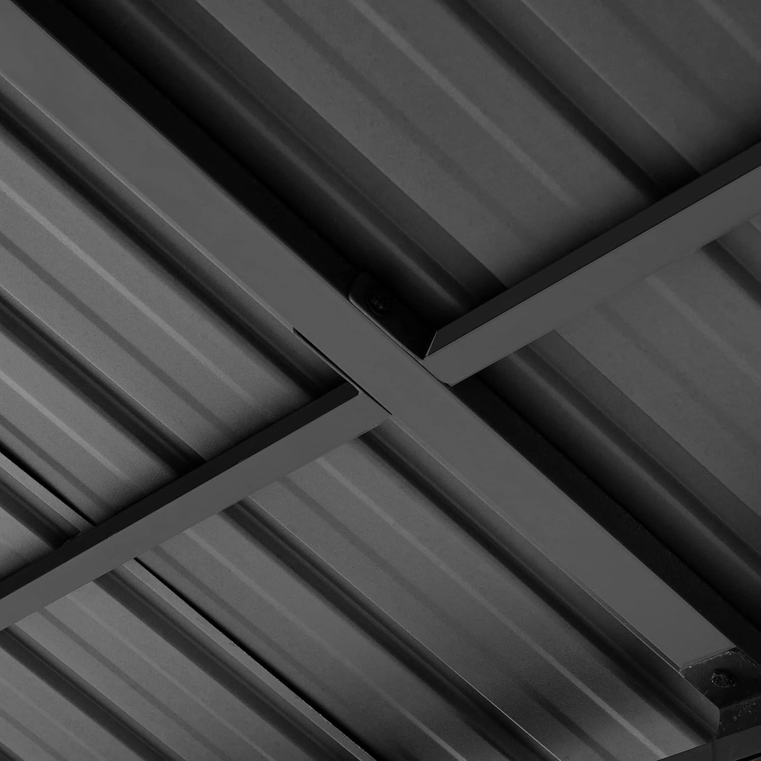 Close-up of a gazebo roof corner, showing the robust connection points and the corrugated steel roof panels