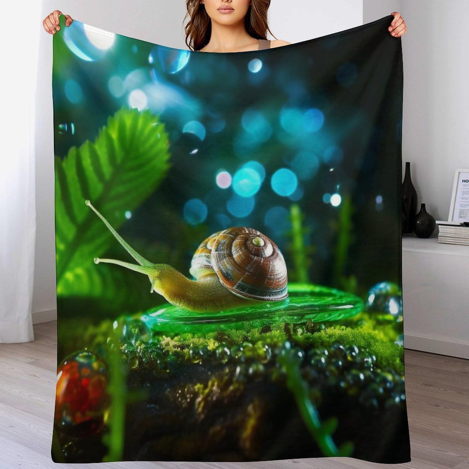 Couverture confortable douce escargots pour des soirées cocooning sur le canapé