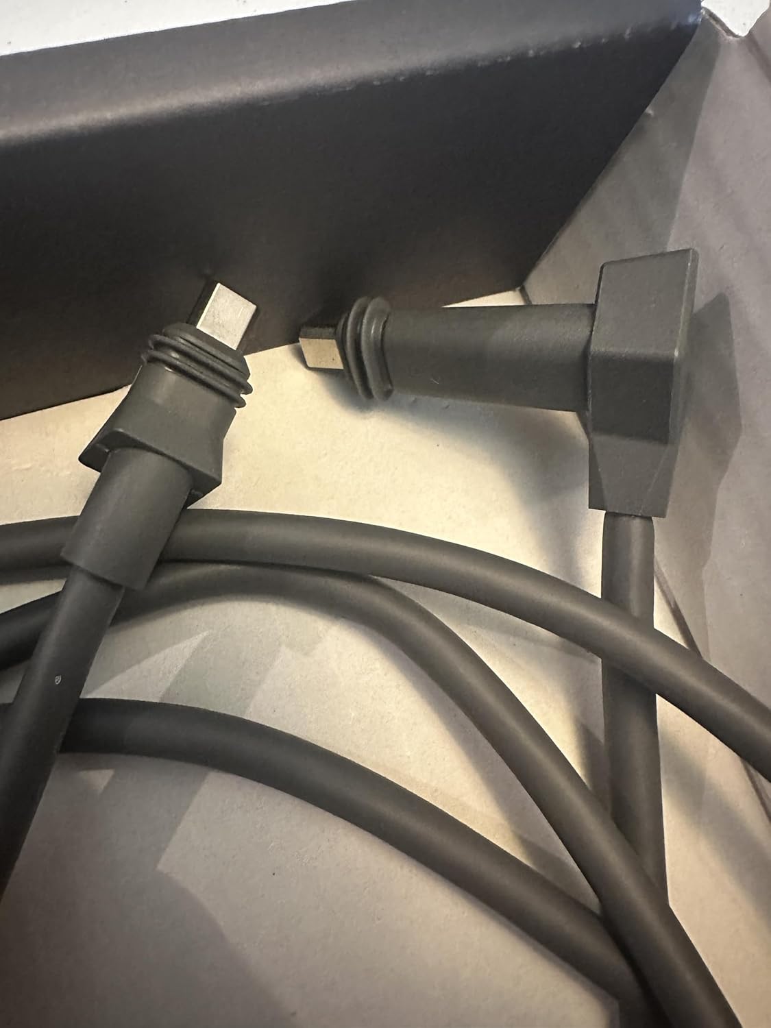Close-up view of two custom Mini HDMI connectors on the Starlink replacement cable.