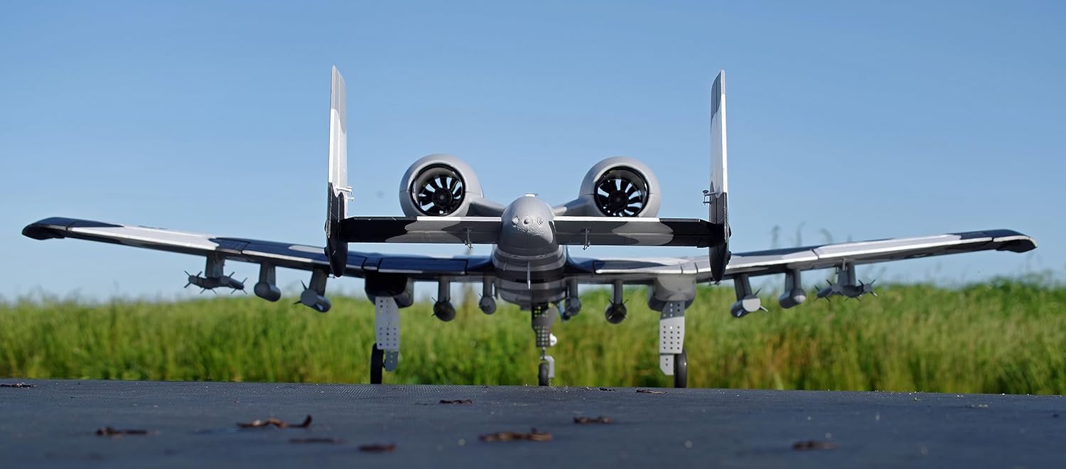 FMS A-10 Thunderbolt II V2 RC Plane in flight, bottom-up view, showing underwing details and twin engines.