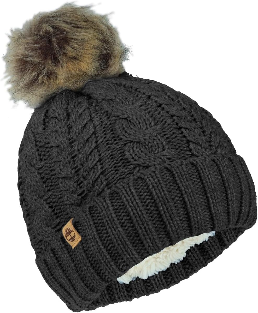 Gorro de punto trenzado con pompón de piel sintética para mujer: gorro de invierno suave, puños acanalados, forro cálido, ropa elegante y acogedora para clima frío