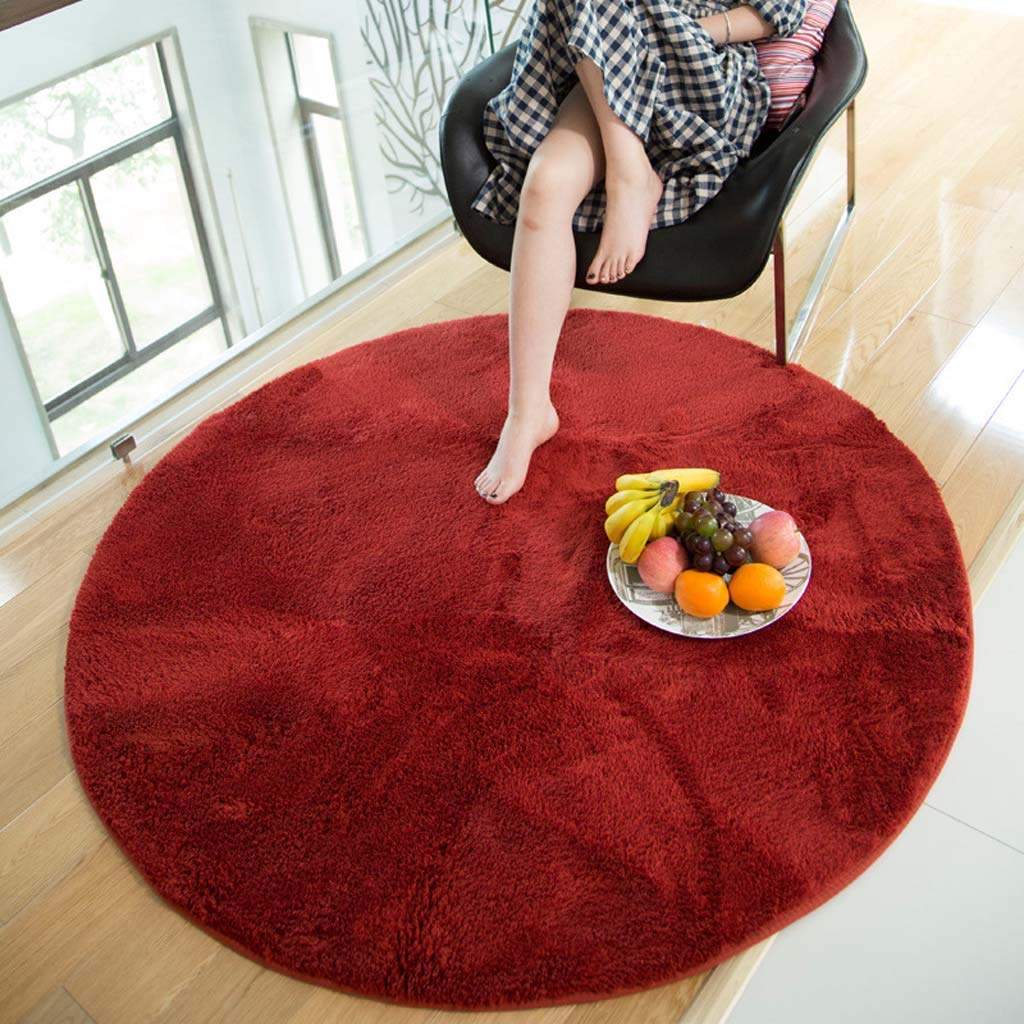 Tapis rond couleur unie doux pour réchauffer le sol du salon et de la chambre