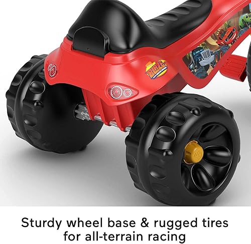 Vista 15 de Fisher-Price Triciclo para niños pequeños Barbie Tough Trike, bicicleta de juguete con agarres de manillar y almacenamiento para jugar al aire