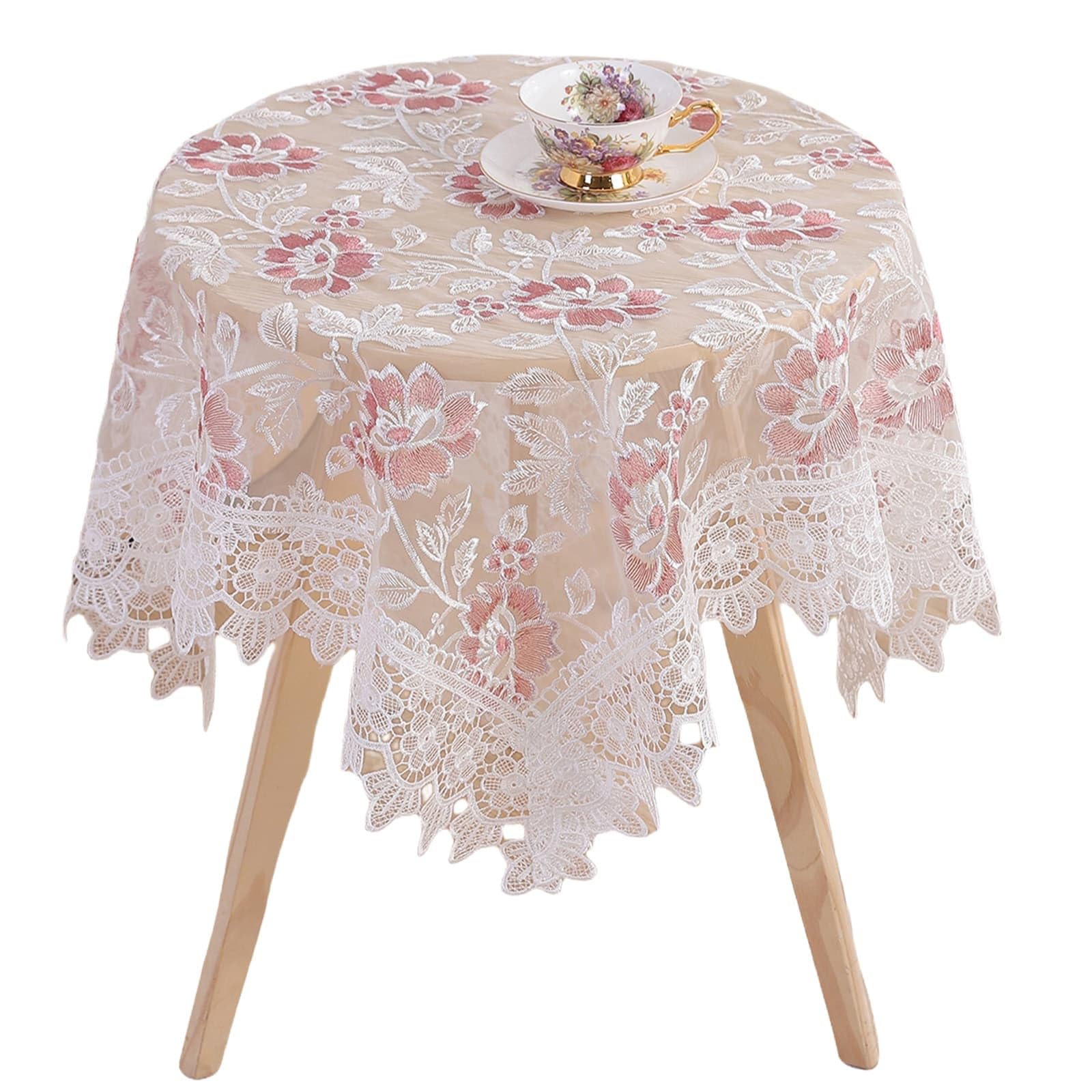 Nappe ronde blanche à motif floral pour embellir instantanément une table banale