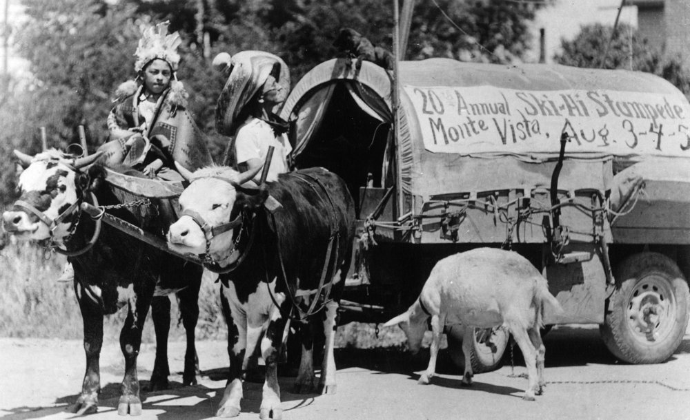 Lantern PressMonte Vista, Colorado - 20th Annual Ski-Hi Stampede, Natives with Covered Wagon Photograph (12x18 Art Print, Wall Decor Travel Poster)