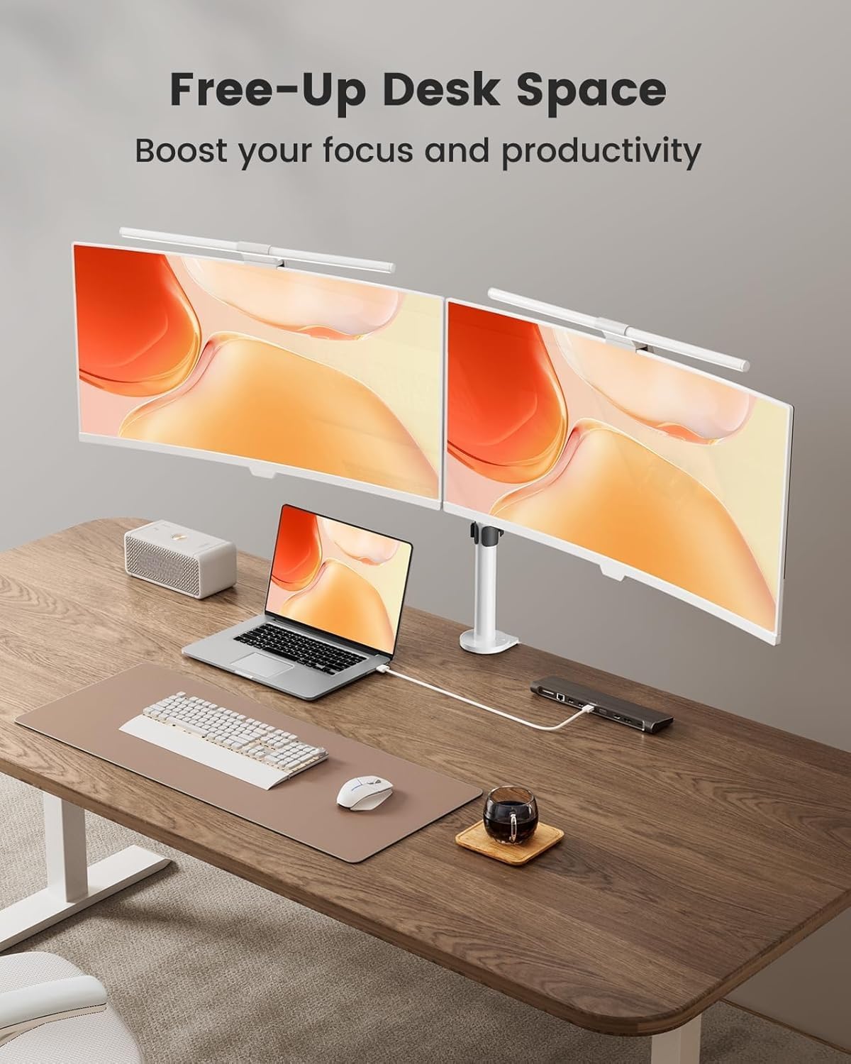 Desk setup with ErGear Dual Monitor Mount freeing up space