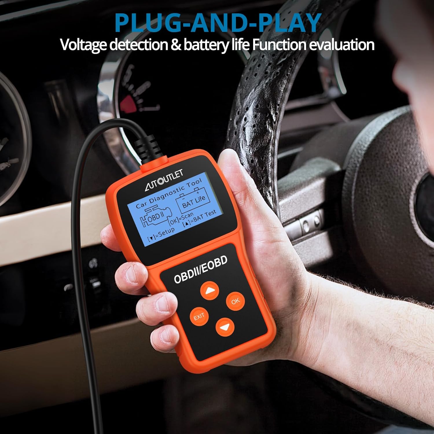 Hand holding the diagnostic tool connected to a car's OBDII port