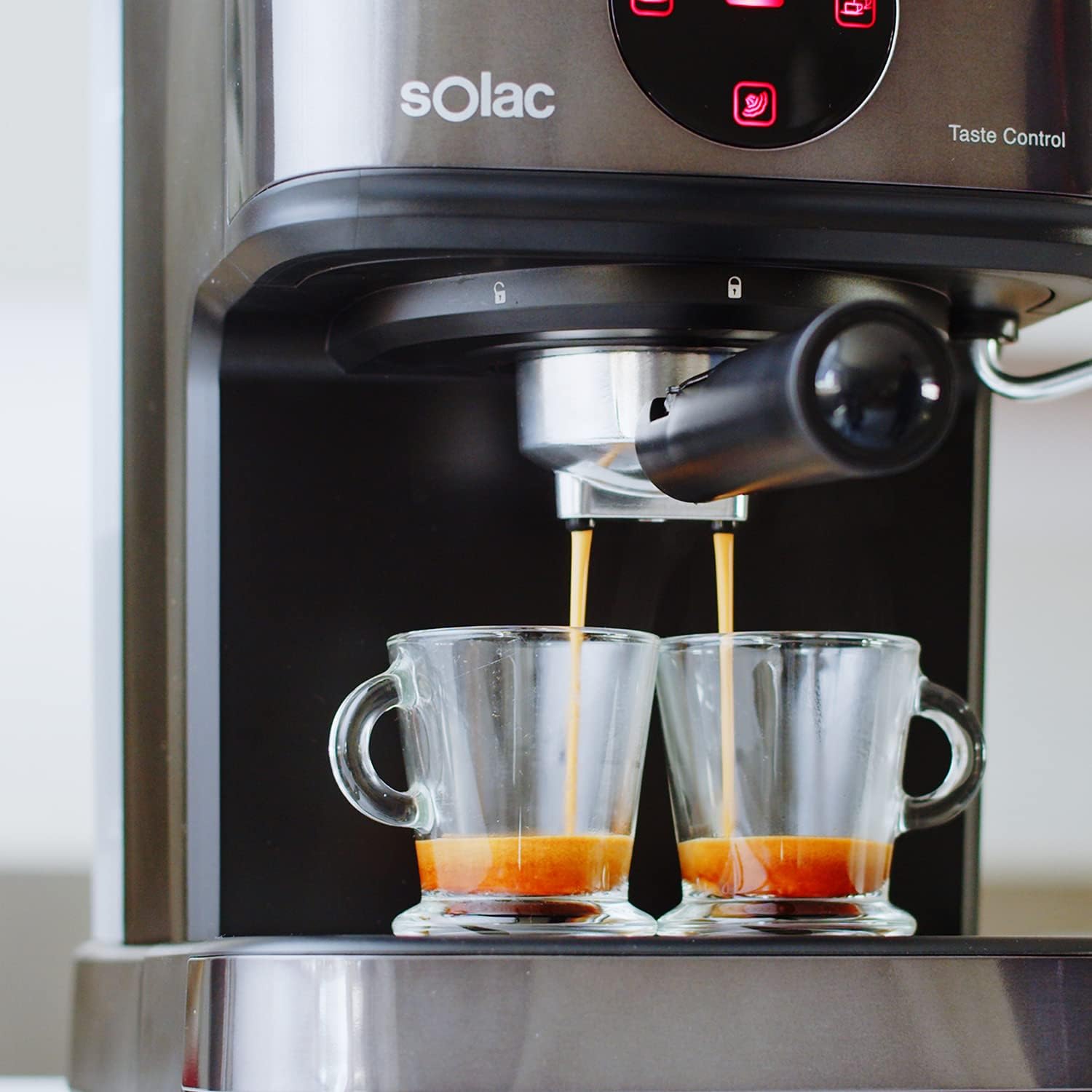 Two espresso shots being dispensed