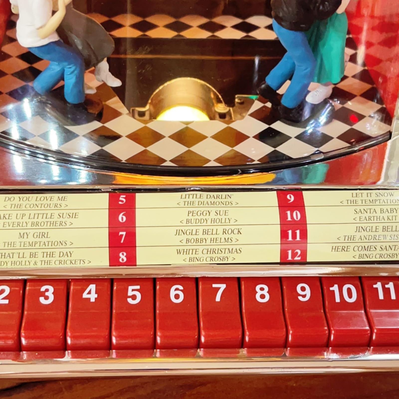 Jukebox retrò con altoparlante integrato e design classico anni '50, riproduce 12 canzoni con presentazioni sincronizzate
