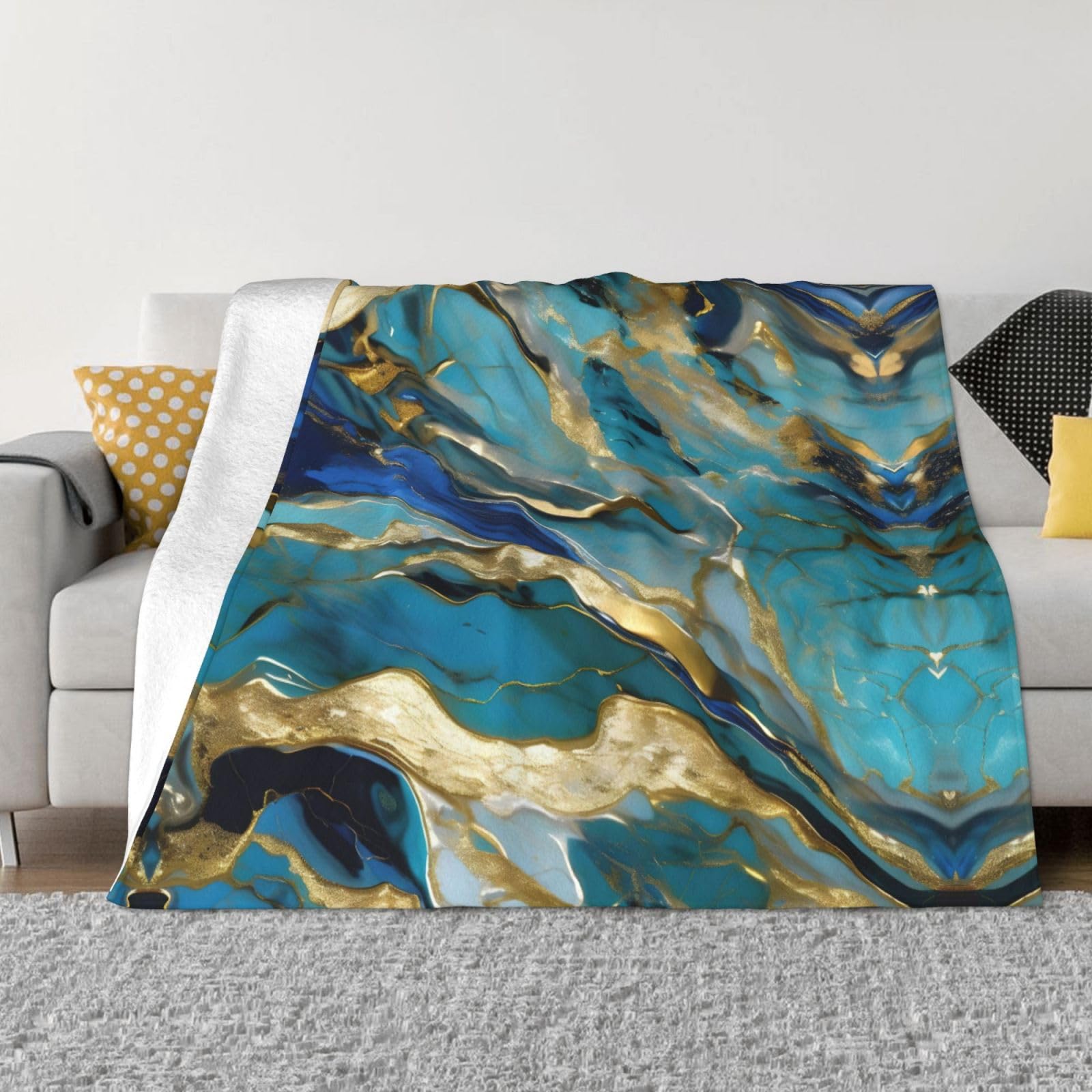 Couverture douce et chaude bleu-vert pour vos soirées cocooning sur le canapé ou au lit