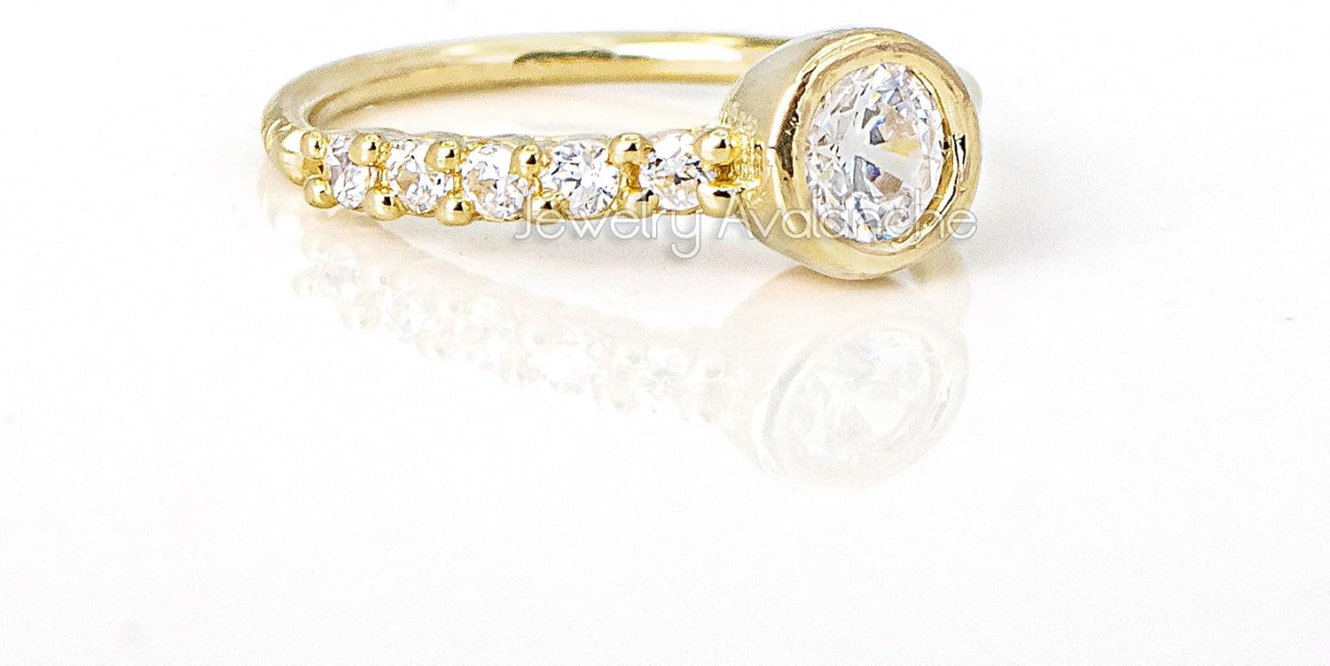 Jewelry Avalanche 20G 14K Yellow Gold Bezel Set CZ Nose Hoop Ring Twist-open 5/16"(8mm) Nose Ring, Unisex, Diamond Simulated Stones 14KNH1BZ5P-CZYG