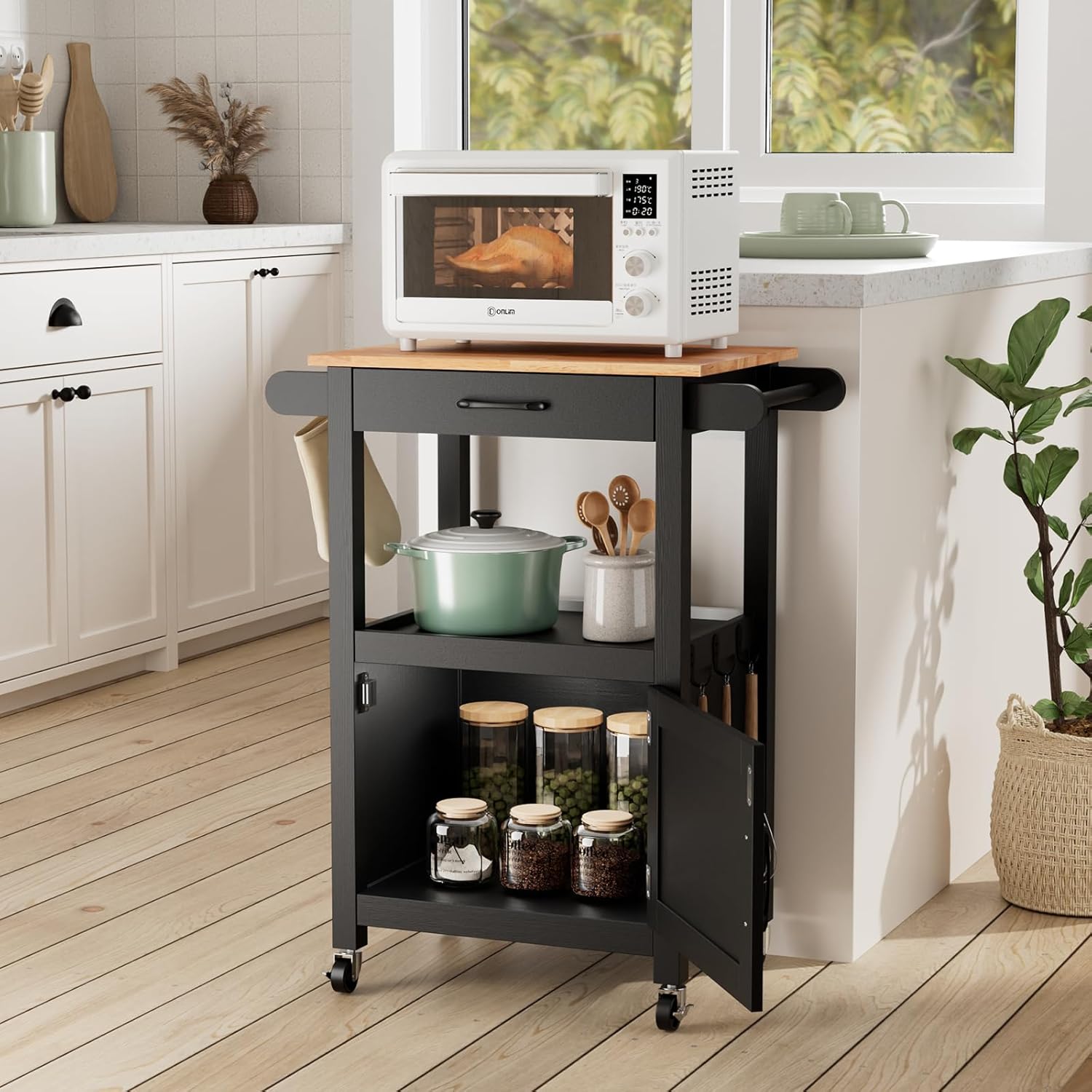 VINGLI Rolling Kitchen Cart in a kitchen setting with a microwave on top and kitchen items stored inside.