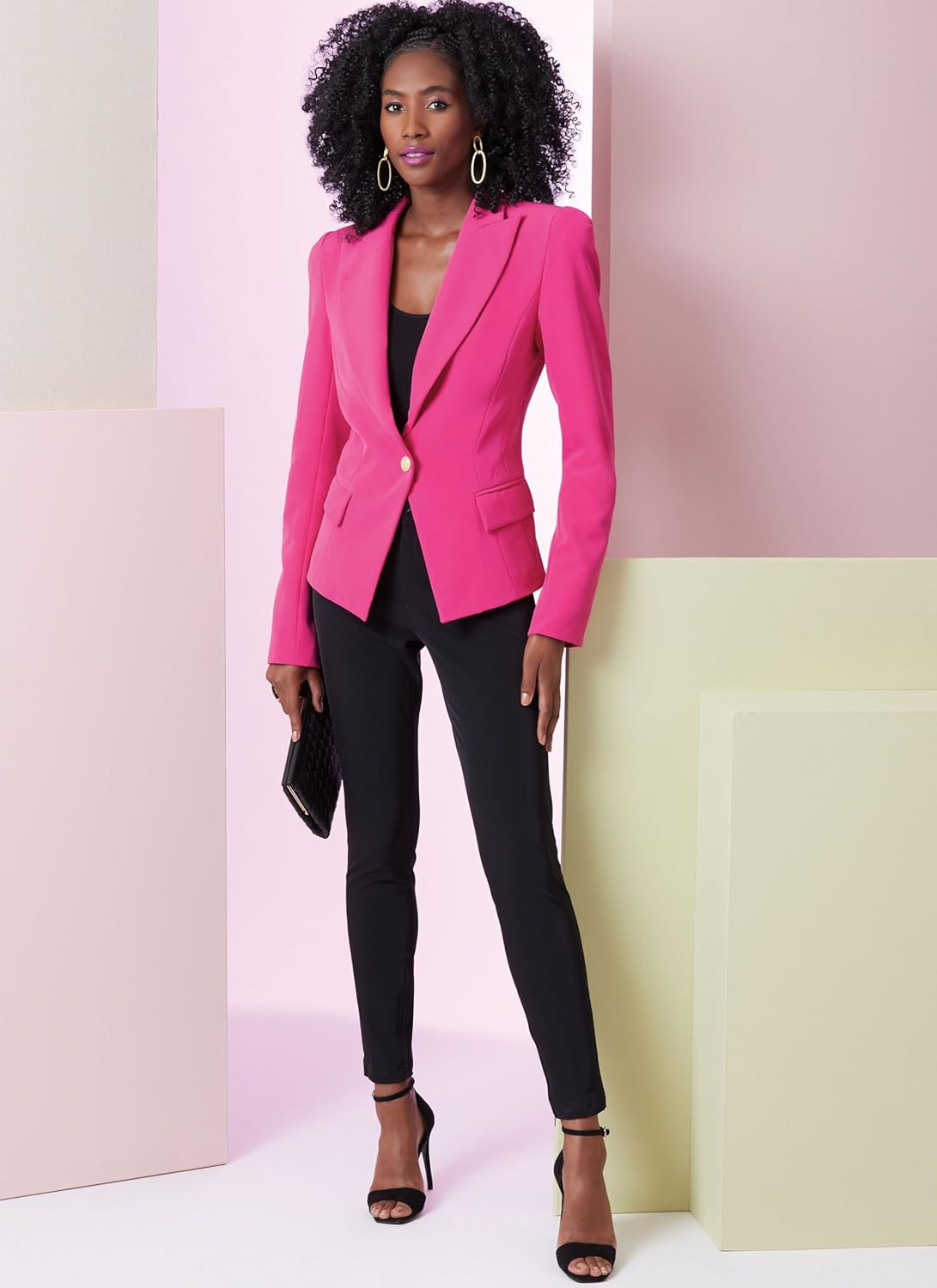Full-length view of a model wearing the finished View A jacket in pink with black trousers, showcasing the overall silhouette.
