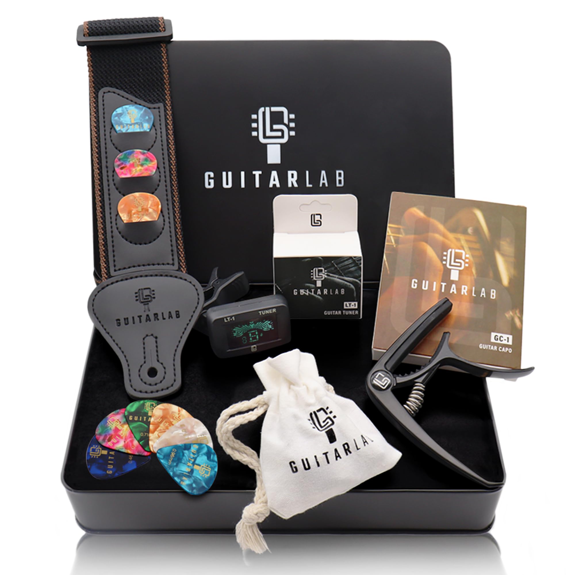 Guitar Lab Kit di accessori per chitarra – Scatola in metallo di alta qualità con cinghia per chitarra, capotasto e sintonizzatore per chitarra elettronica a clip, plettri acustici, bassi