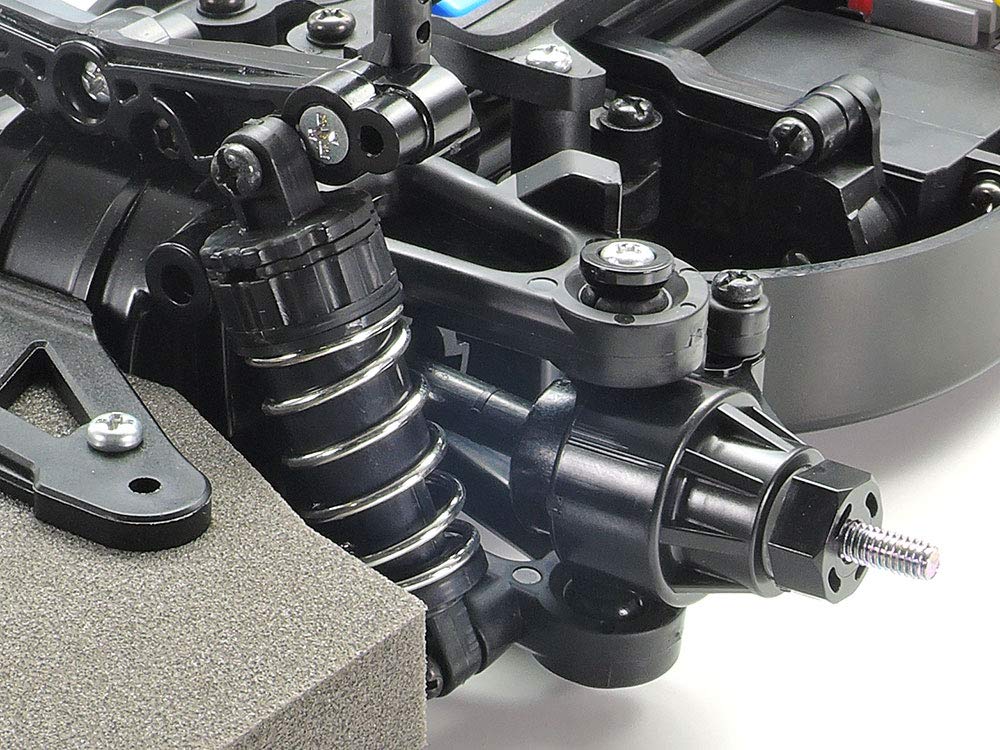 Tamiya 58701 1:10 RC Opel Calibra V6 Cliff (TT-01E) - ferngesteuertes Auto, RC Fahrzeug, Modellbau, Bausatz zum Zusammenbauen, Hobby, Basteln