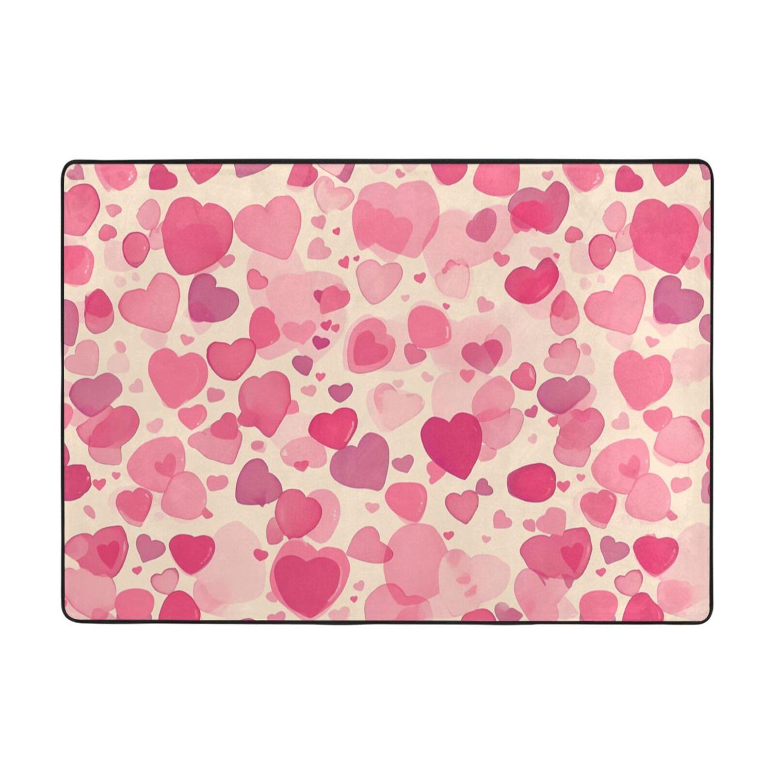 Tapis imprimé cœurs roses pour créer un coin jeu doux et cosy