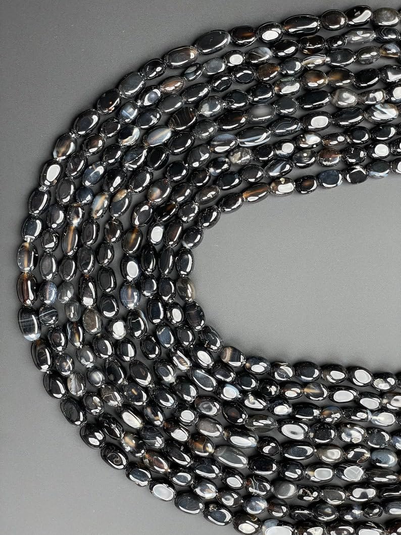 Onyx noir naturel AAA facetté en perles ovales pour créer un collier d'exception