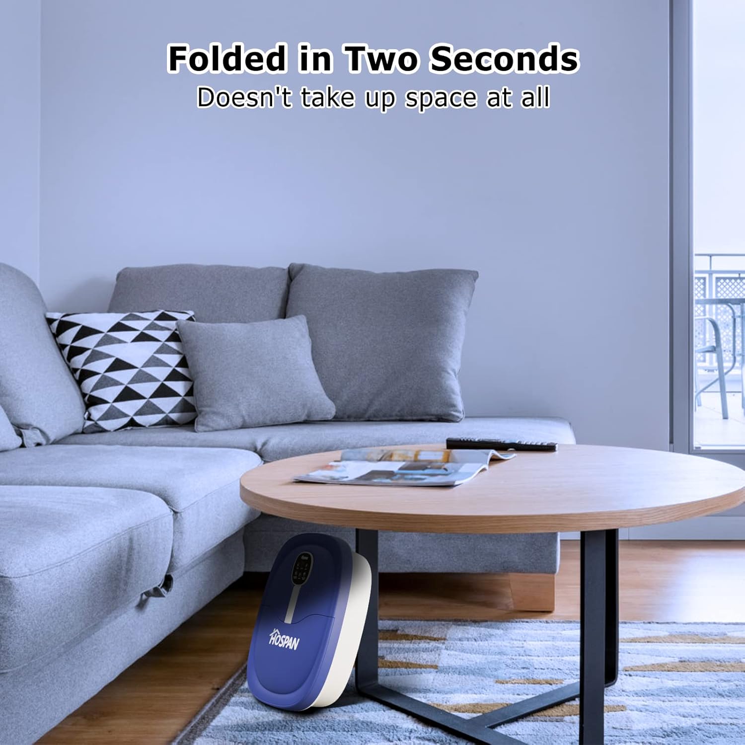 HOSPAN Foot Spa shown in its compact, folded state under a coffee table, demonstrating its space-saving design.