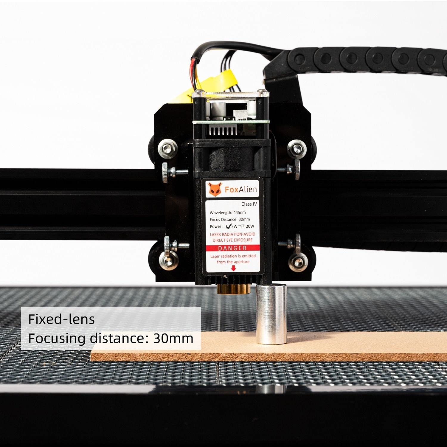 Close-up of the laser module with a metal cylinder indicating the 30mm focusing distance.
