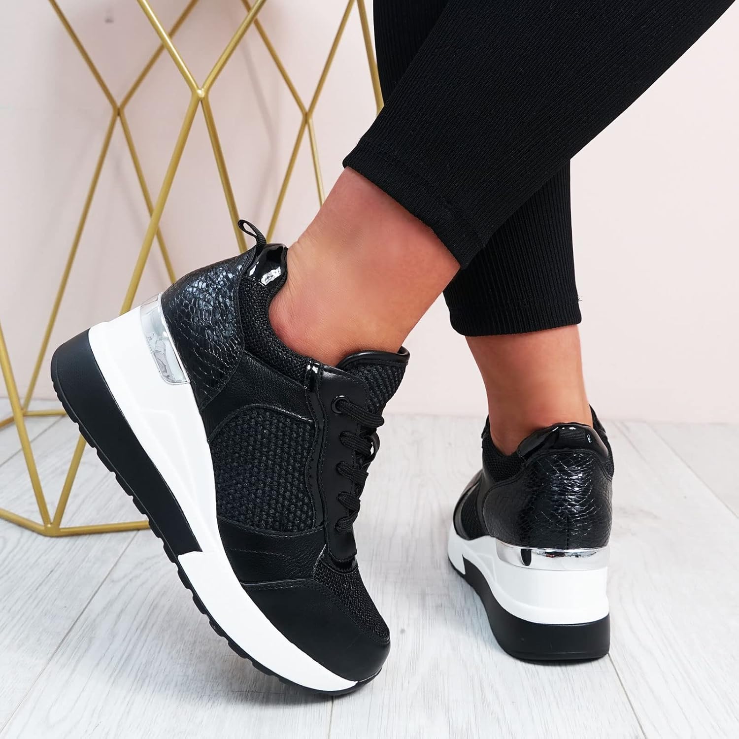 black trainers with heels