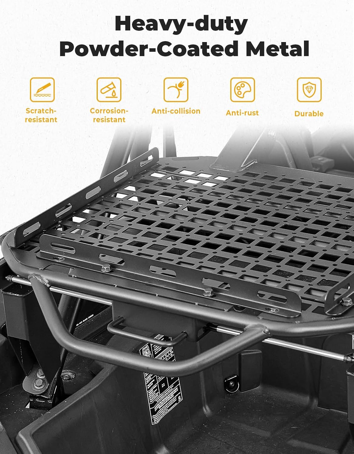 A large grey storage box securely strapped onto the KEMIMOTO cargo rack, with a green storage box visible in the vehicle's bed below.