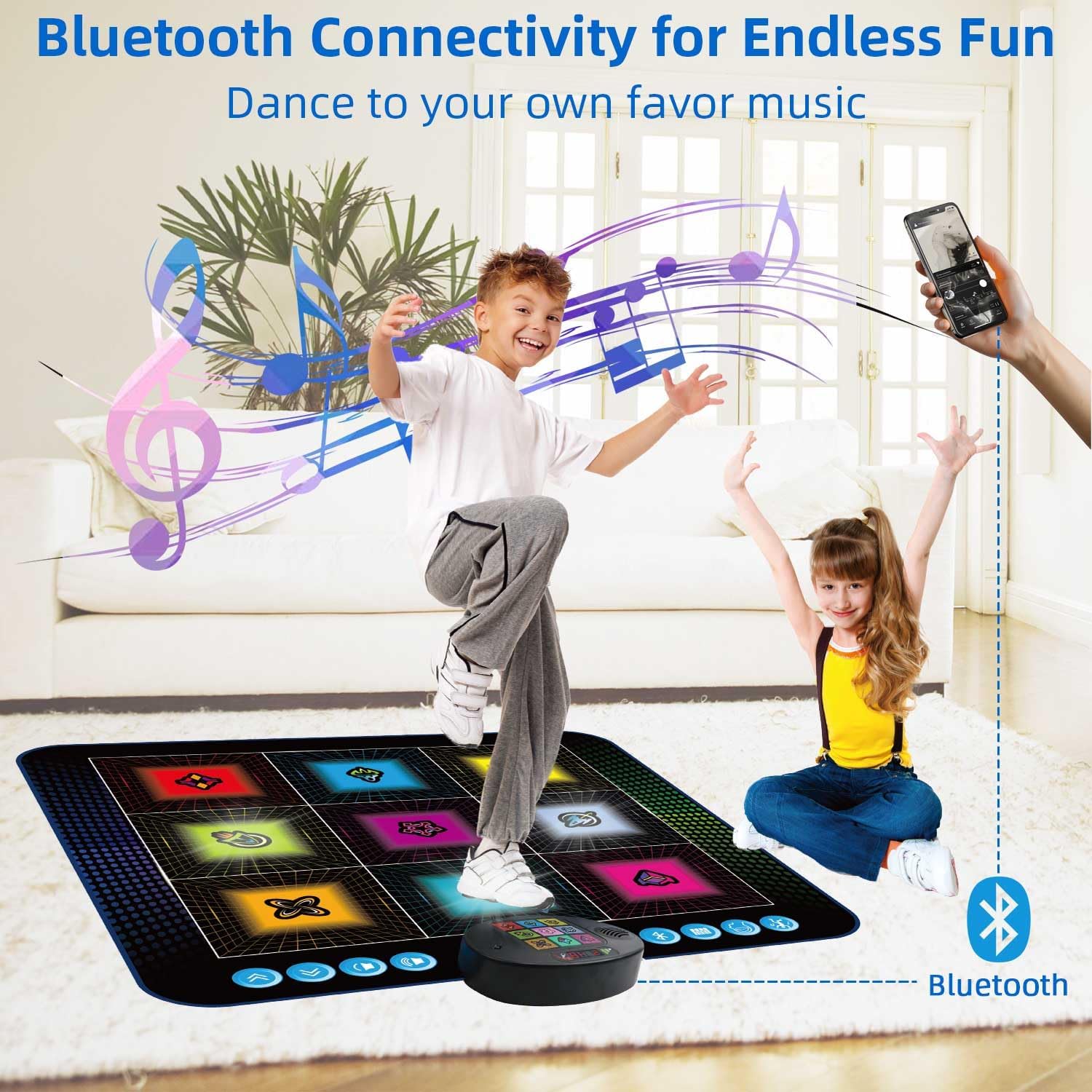 Child dancing on SUNLIN Dance Mat with phone connected via Bluetooth