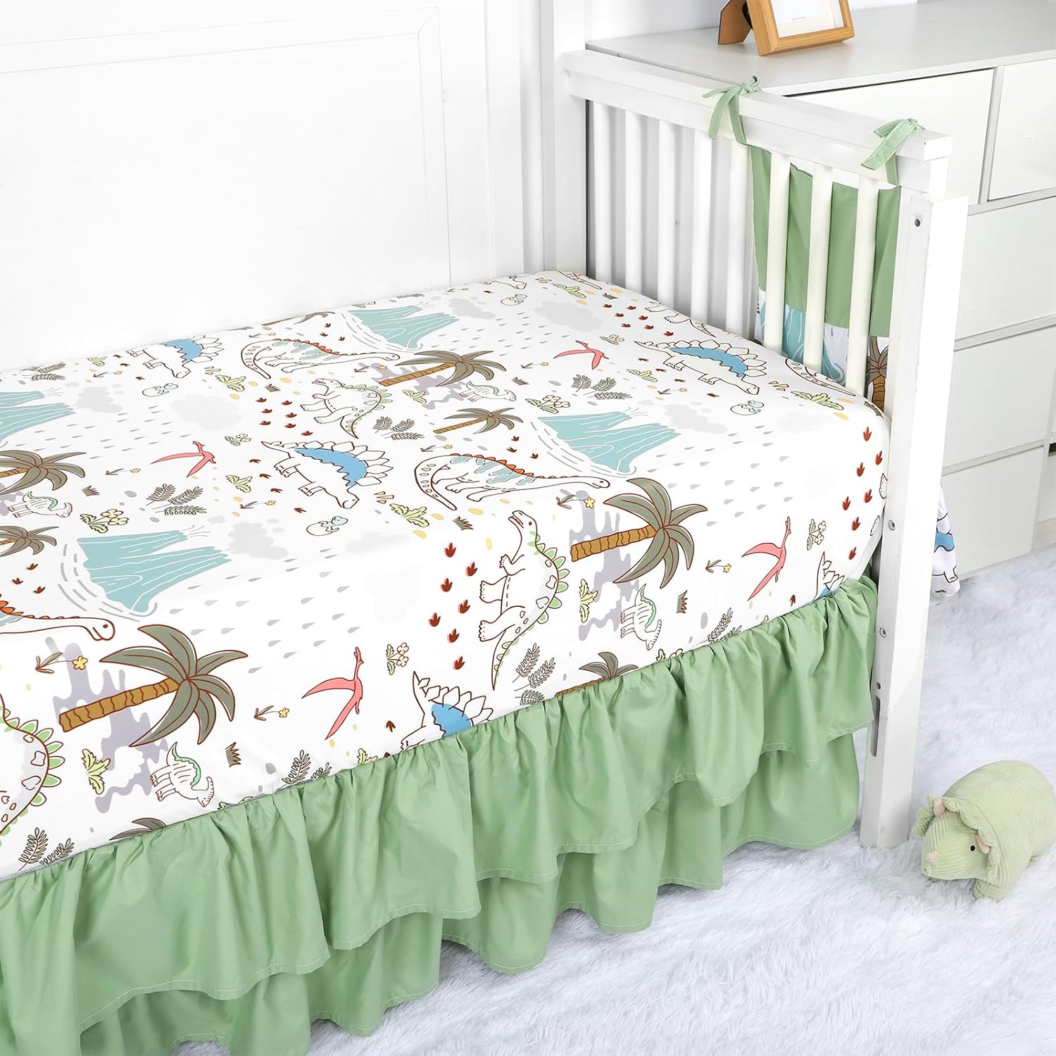 SWESEN Dinosaur Crib Bedding Set 4-Piece for Boys, Crib Set Includes Quilt, Fitted Sheet, Skirt, Diaper Stacker,Ultra-Soft Nursery Bedding Set-Fits Standard 52x28 inch Crib mattresses